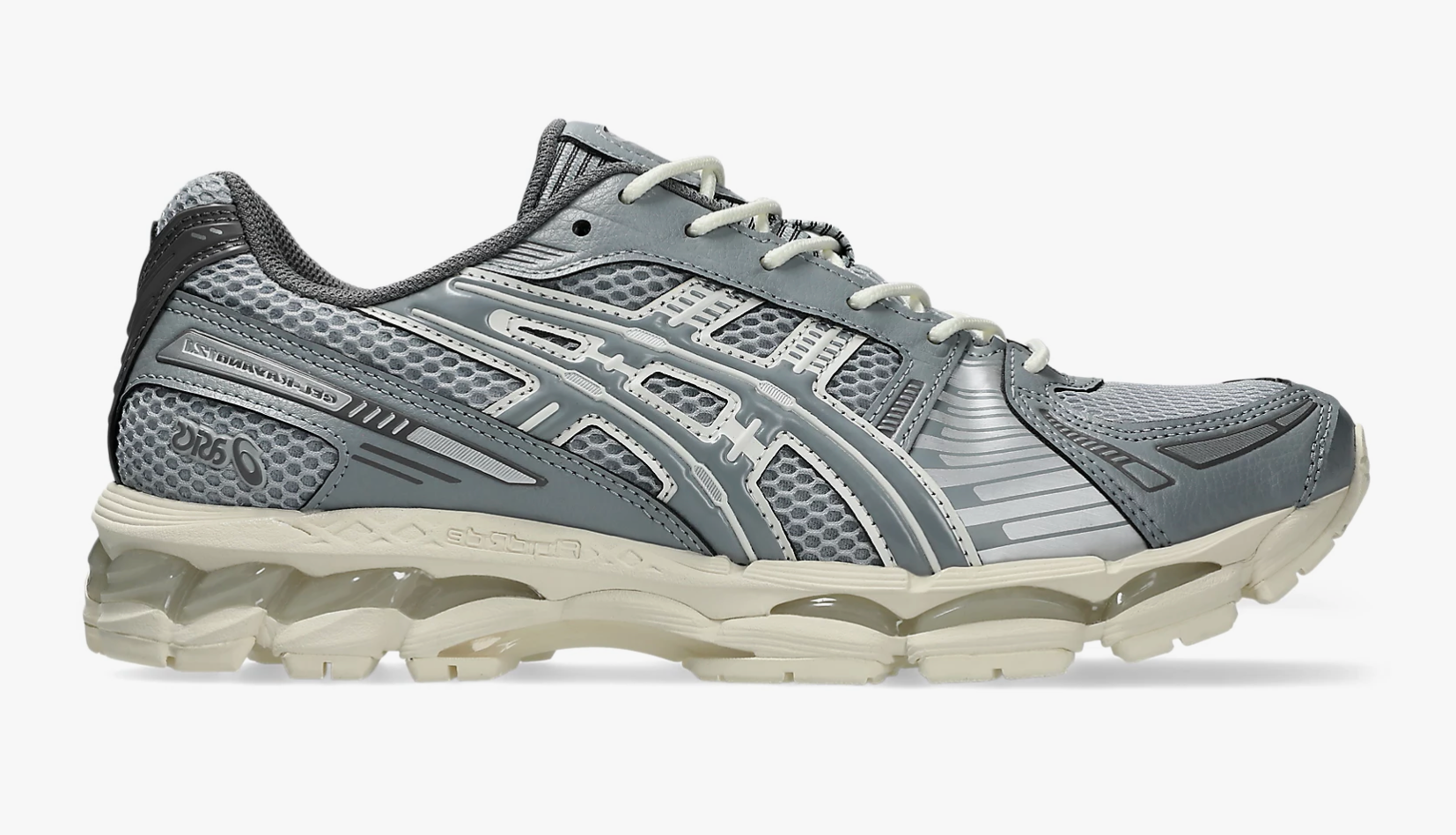 ASICS Gel-Kayano 12.1 Piedmont Grey Gravel grise avec mesh respirant, empiècements techniques et semelle GEL FLUIDRIDE.