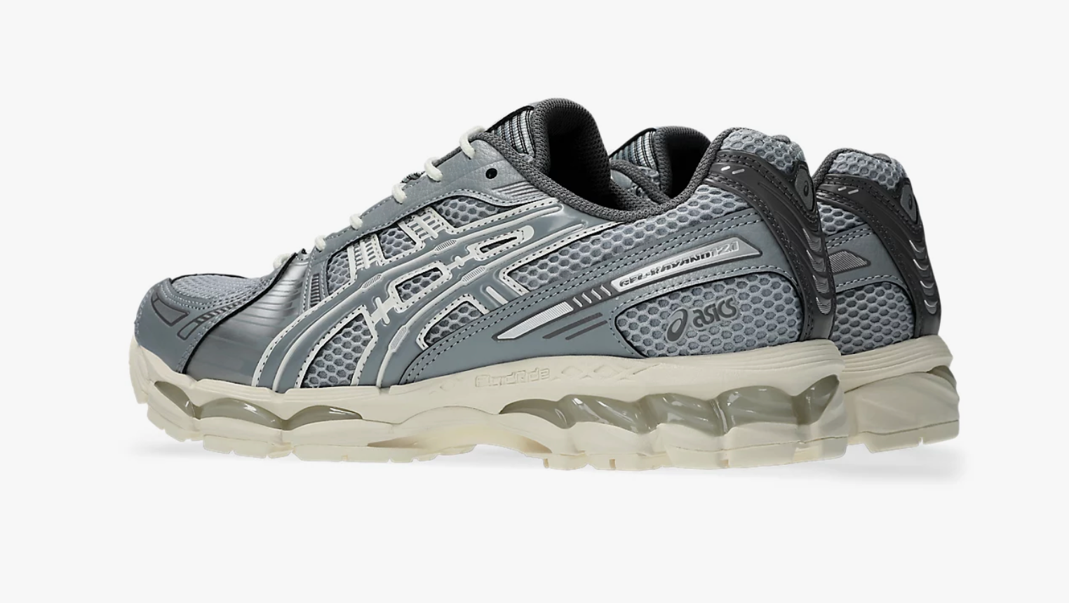 ASICS Gel-Kayano 12.1 Piedmont Grey Gravel grise avec mesh respirant, empiècements techniques et semelle GEL FLUIDRIDE.