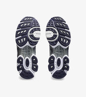 ASICS Gel-Nimbus 9 en mesh Oatmeal avec détails Indigo Fog et amorti GEL visible.