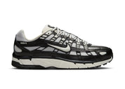 Nike P-6000 Black Muslin Sail noire et beige avec base en mesh, empiècements superposés, détails Sail et silhouette rétro-running Y2K vue de profil. 