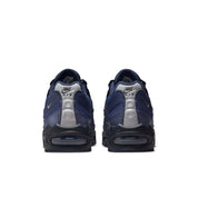 Sneakers Nike Air Max 95 Zip SP Loyal Blue bleues en matières techniques avec zip frontal et amorti Air Max visible. Vue de derrière 