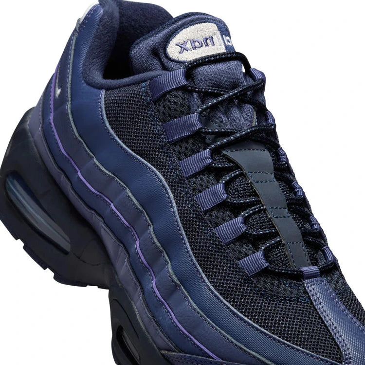 Sneakers Nike Air Max 95 Zip SP Loyal Blue bleues en matières techniques avec zip frontal et amorti Air Max visible. Zoom avant 