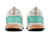 Sneakers Nike Vomero 5 junior en Bleached Turquoise et Orange Chalk avec mesh respirant et amorti Zoom Air premium