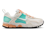 Sneakers Nike Vomero 5 junior en Bleached Turquoise et Orange Chalk avec mesh respirant et amorti Zoom Air premium