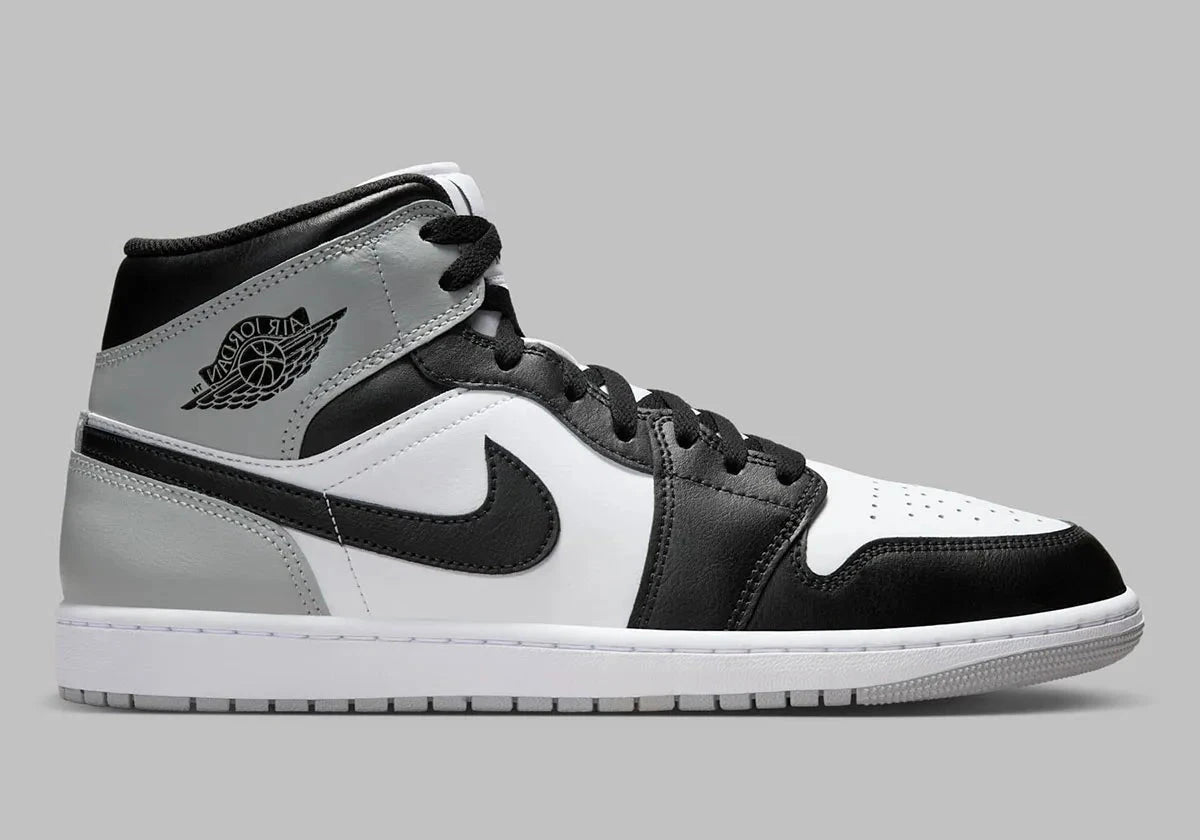 Chaussure de ville Air Jordan 1 Mid Barons   , noir , blanc , gris , semelle confortable , vu de profil