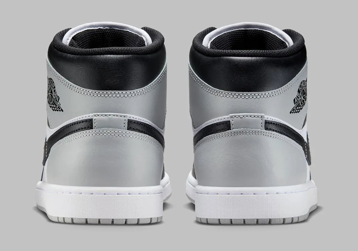 Chaussure de ville Air Jordan 1 Mid Barons   , noir , blanc , gris , semelle confortable , vu de derrière