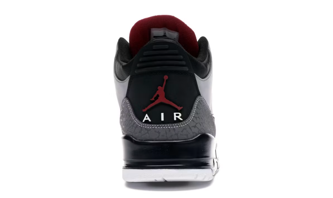 Air Jordan 3 Retro Stealth 136064-003 en nubuck gris avec Elephant Print, accents rouges, lacets blancs, semelle noire et unité Nike Air visible.