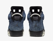 Air Jordan 6 Retro Washed Denim CT5350-401 en denim bleu délavé avec détails Varsity Red, empiècements en cuir et semelle translucide.