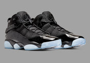 Air Jordan 6 Rings Black Ice 322992-011 noire en mesh balistique et cuir verni avec sangle, toggle et semelle extérieure translucide glacée.