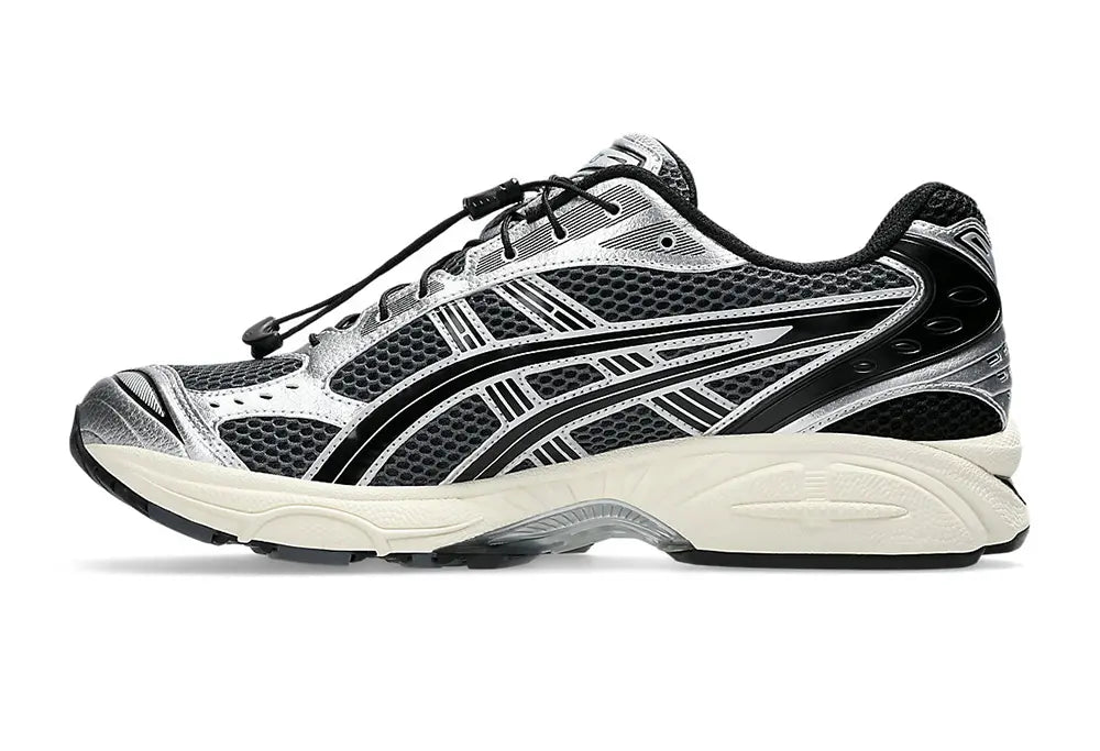 Image de la ASICS Gel-Kayano 14 Unlimited Pack Carrier Grey, sneaker argent et gris en mesh avec renforts synthétiques et amorti GEL™ visible.