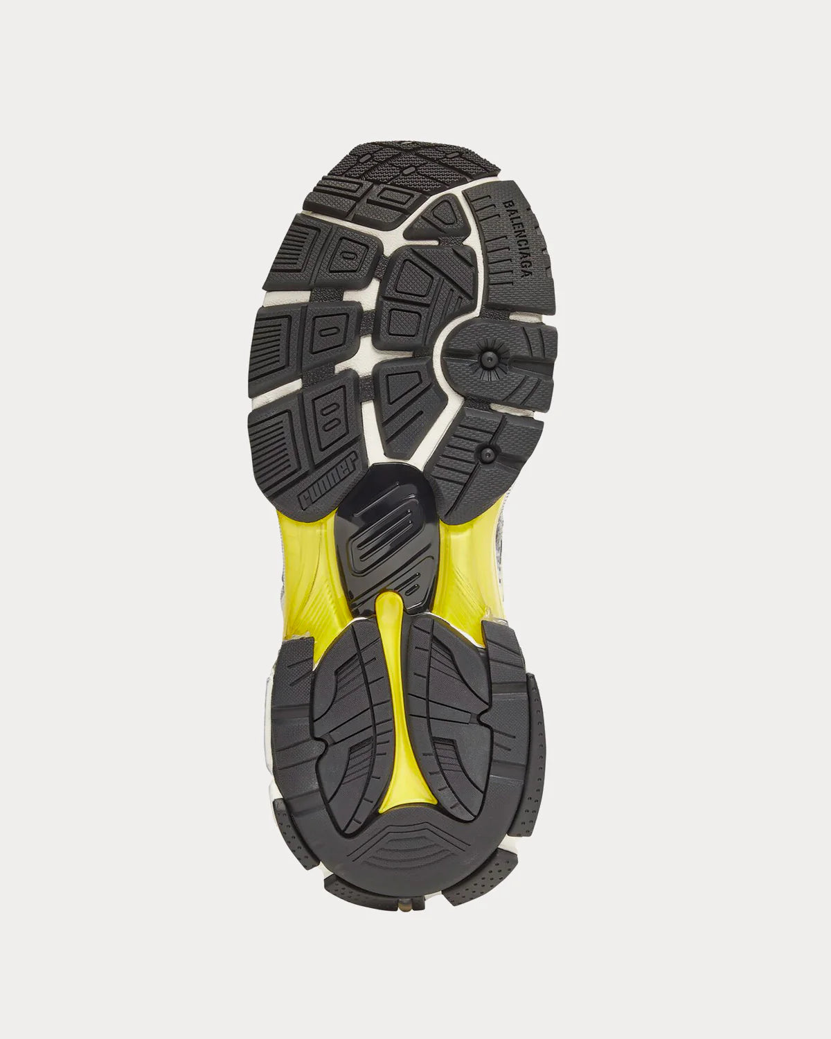 Balenciaga Runner White Blue Yellow Grey Black avec tige en mesh respirant, empiècements en cuir multicolore, semelle intermédiaire en mousse et silhouette inspirée du running vintage.