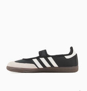 Sneaker adidas Samba Jane Black Off White en cuir noir et blanc cassé avec bride Mary Jane et semelle basse iconique.