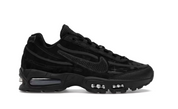 Sneakers Nike Air Max 95 SP Worksout Black en textiles techniques noirs avec unités Air visibles et design ondulé iconique.Vue de coté 