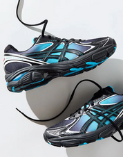 Sneakers ASICS GT-2160 Kith Marvel Villains Venom en noir, violet et bleu avec mesh respirant, co-branding Marvel et confort premium.Vue de profil