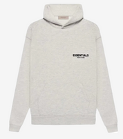 Sweat Fear Of God Essentials gris clair chiné en coton épais avec coupe oversize et logo discret minimaliste
