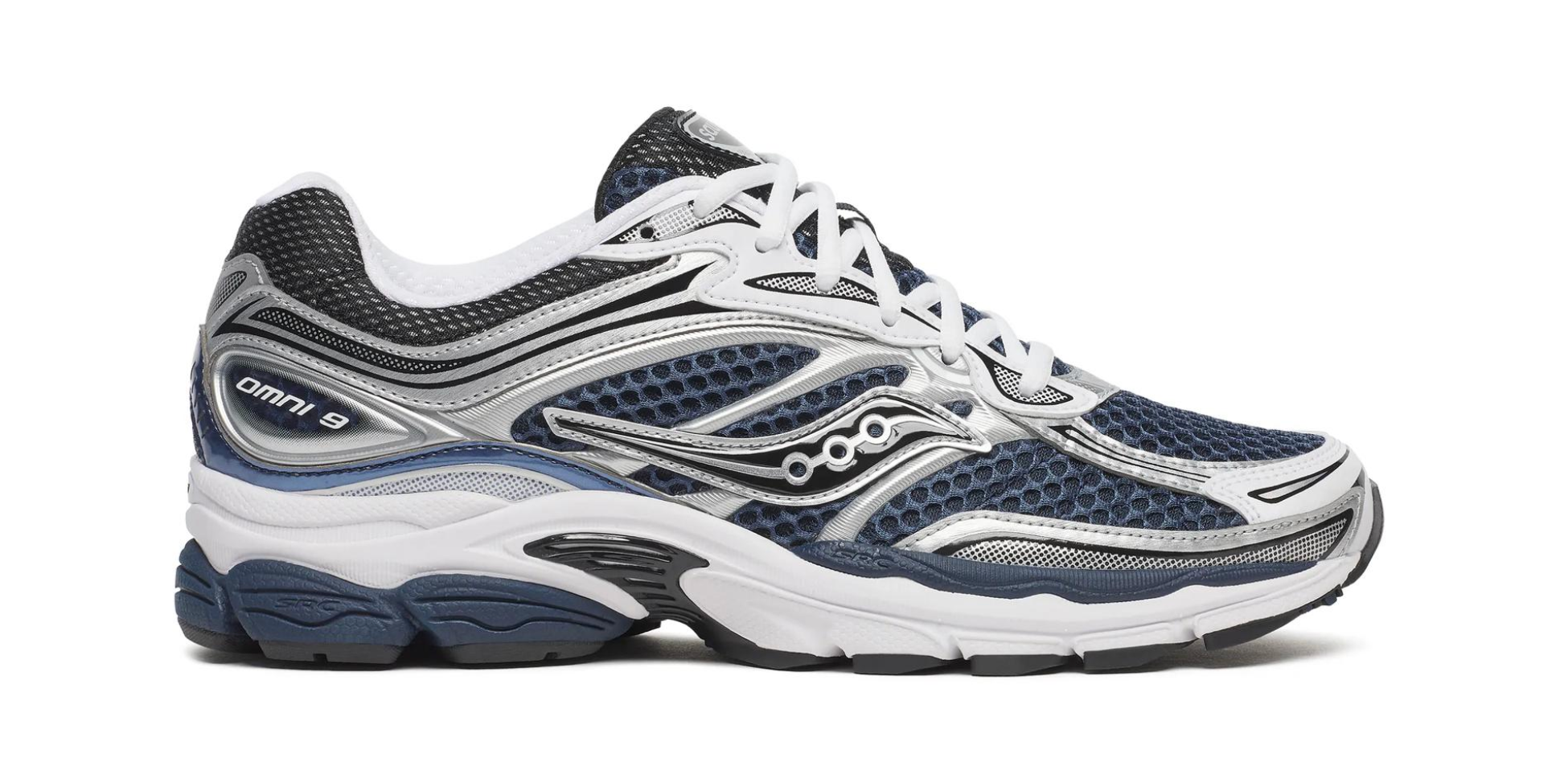 Saucony ProGrid Omni 9 Deep Navy en mesh bleu marine avec empiècements suède et semelle amortissante ProGrid. vue de profil