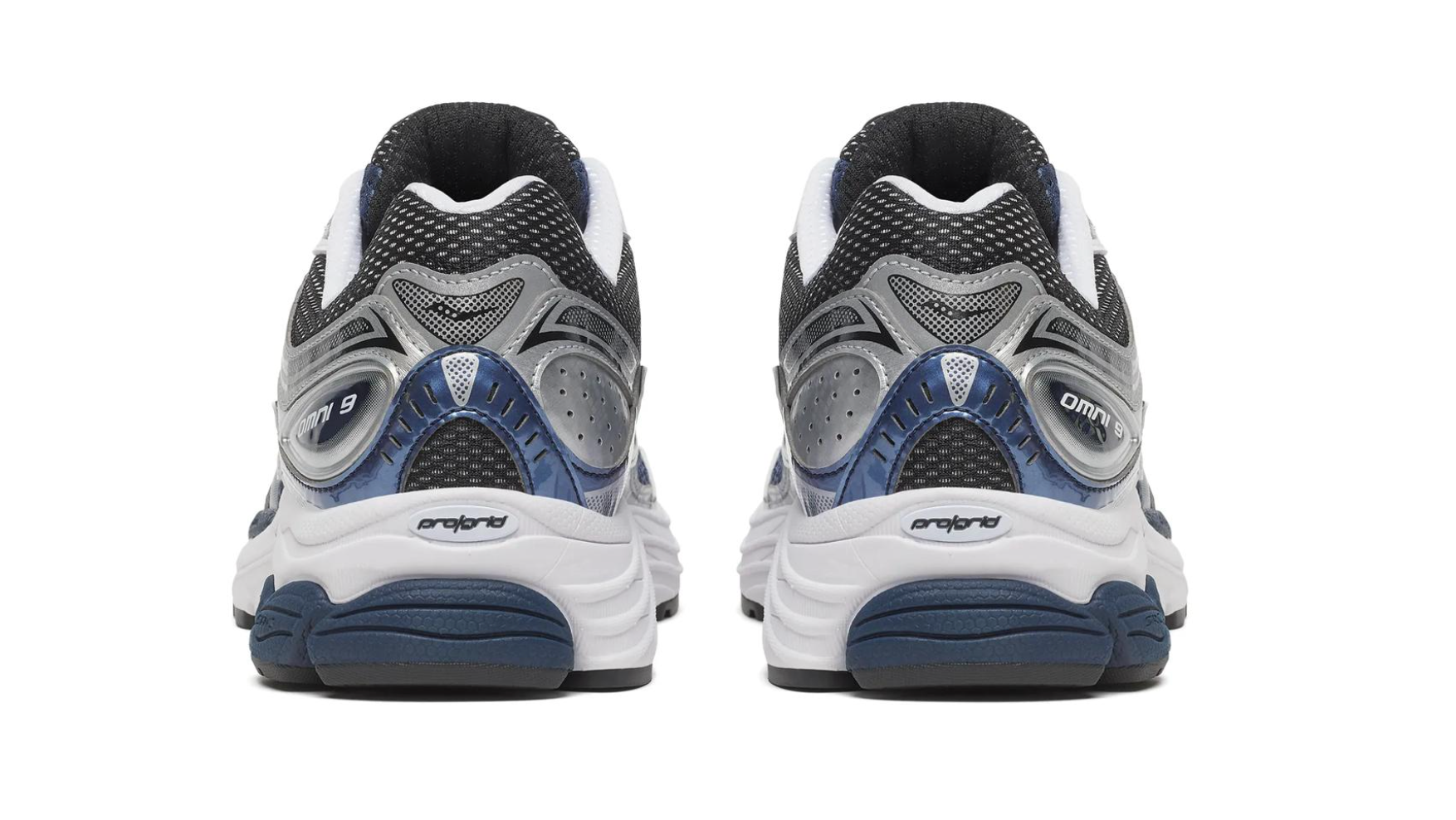 Saucony ProGrid Omni 9 Deep Navy en mesh bleu marine avec empiècements suède et semelle amortissante ProGrid. vue de derrière