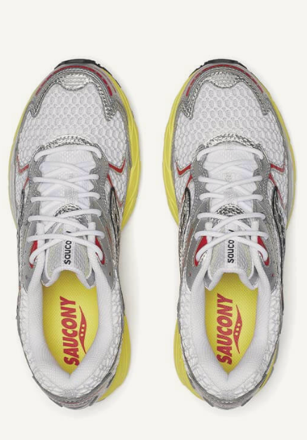 Saucony ProGrid Ride 1 White Buttercup avec tige en mesh respirant, empiècements synthétiques blancs et jaunes Buttercup, technologie ProGrid et semelle extérieure en caoutchouc.