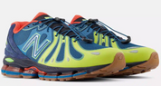 New Balance 1890 Streamsong avec tige en mesh respirant, empiècements en daim premium, cuir et matières synthétiques dans un coloris Streamsong, dotée d'une semelle extérieure en caoutchouc.