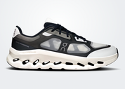On Running Cloudtilt Remix Black Ivory, sneaker lifestyle On Running noire et ivoire équipée de la technologie CloudTec Phase® et de l'amorti Helion™.
