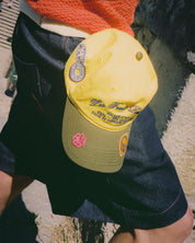 Casquette Maison Atnav "Le Citron", casquette jaune citron et vert olive avec broderie Maison Atnav, visière préformée et écussons décoratifs.