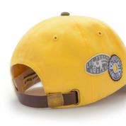 Casquette Maison Atnav "Le Citron", casquette jaune citron et vert olive avec broderie Maison Atnav, visière préformée et écussons décoratifs.