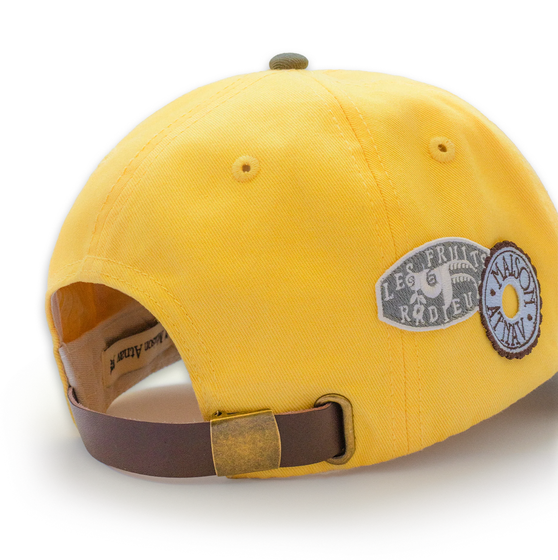 Casquette Maison Atnav "Le Citron", casquette jaune citron et vert olive avec broderie Maison Atnav, visière préformée et écussons décoratifs.