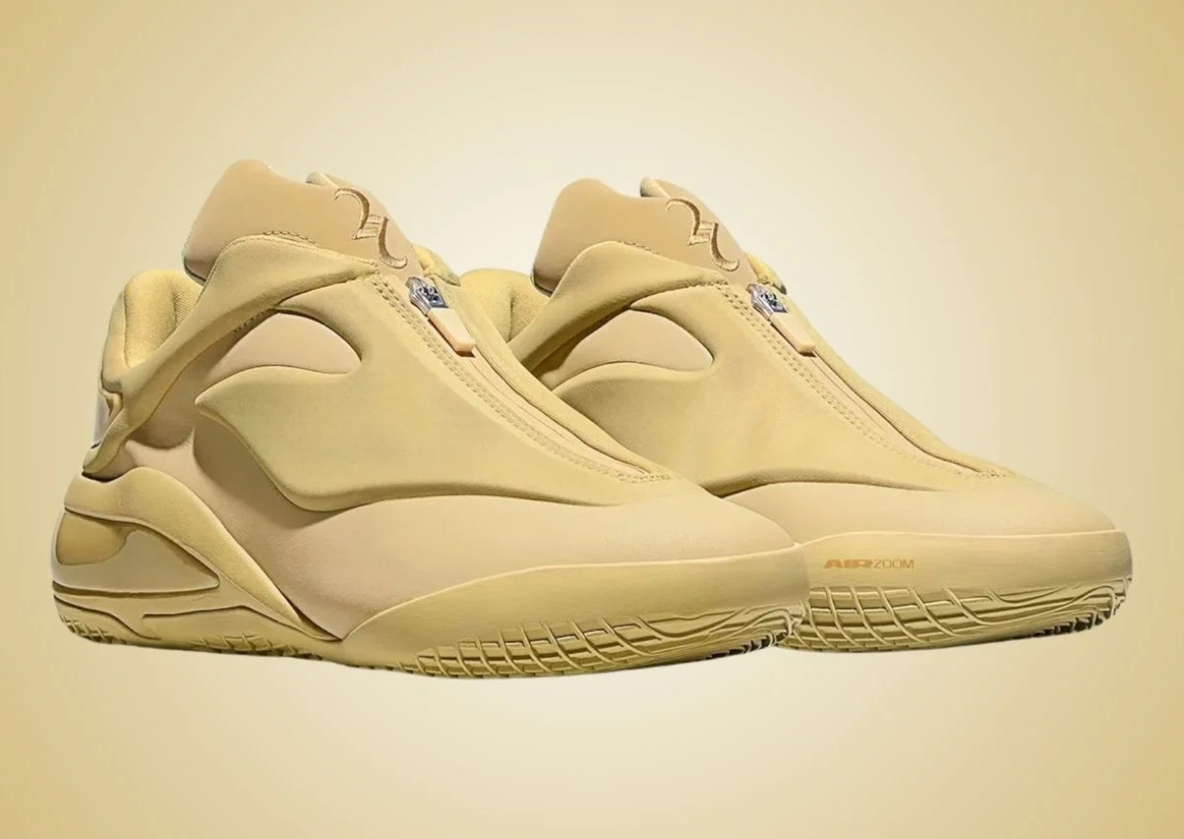 Converse SHAI 001 Butter, sneaker de basketball jaune crème monochrome avec empeigne moulée, fermeture zippée et silhouette futuriste.