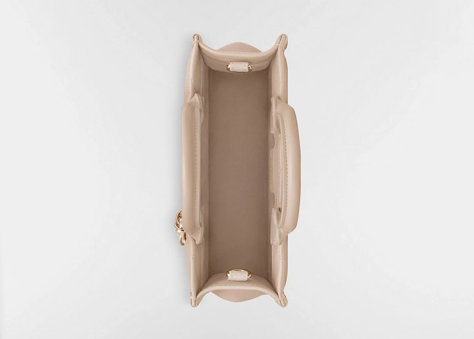 Dior Mini Dior Book Macrocannage Calfskin Tote Powder Beige, mini sac cabas en cuir de veau beige poudré avec surpiqûres Cannage et charms D.I.O.R. dorés vue de dessus. 