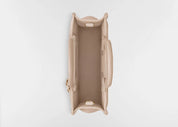 Dior Mini Dior Book Macrocannage Calfskin Tote Powder Beige, mini sac cabas en cuir de veau beige poudré avec surpiqûres Cannage et charms D.I.O.R. dorés vue de dessus. 