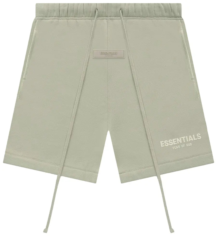 Fear of God Essentials Classic Fleece Sweatshort Abbey Stone, short en molleton beige-gris à coupe ample avec taille élastiquée et logo Essentials.