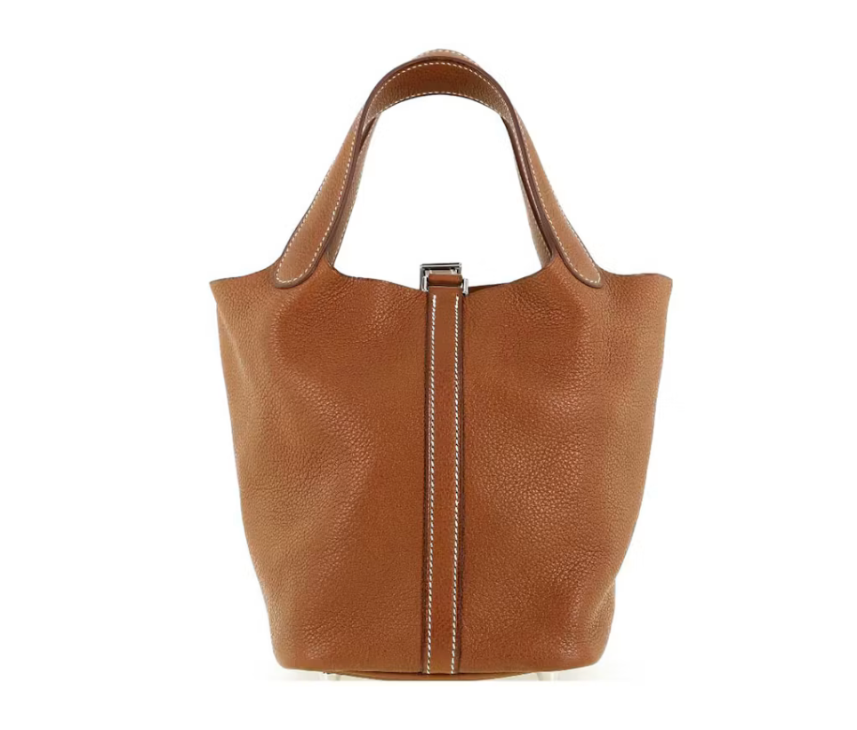 Hermes Bag Picotin 18 Lock Clemence Leather Gold, sac seau en cuir taurillon Clémence camel Gold, deux anses arrondies et cadenas doré.