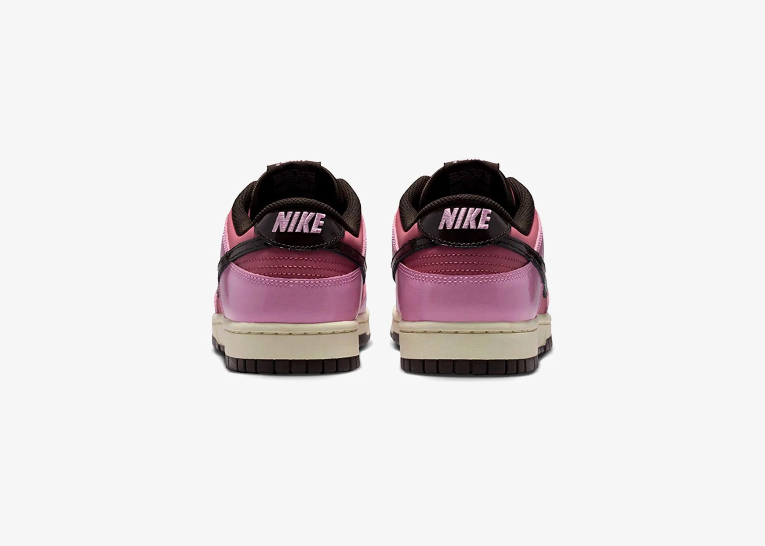 Nike Dunk Low Retro Pink Donut avec tige en cuir rose, empiècements assortis, semelle intermédiaire en mousse et semelle extérieure en caoutchouc au style basketball emblématique.