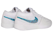 Nike Book 1 Chapter One avec tige en textile respirant, empiècements structurés, amorti Air Zoom et semelle extérieure en caoutchouc conçue pour le basketball vues de 3/4 arrière. 