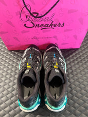 Salomon XT-6 Black d’occasion en état 7,5/10, mesh noir renforcé, détails techniques, sneaker sans boîte.
