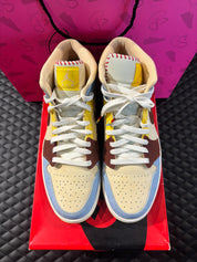 Jordan 1 Mid SE Fearless Maison Château Rouge d’occasion en état 9,9/10, cuir multicolore premium, détails artisanaux, sneaker avec boîte.