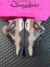 Sneakers Jordan 4 Taupe Haze d’occasion en cuir premium avec amorti Air-Sole visible et semelle caoutchouc durable.