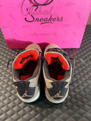 Sneakers Jordan 4 Taupe Haze d’occasion en cuir premium avec amorti Air-Sole visible et semelle caoutchouc durable.