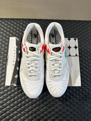 Nike Air Max 1 Evolution of Icons d’occasion, mélange de cuir, suede et mesh, coloris multiples inspirés des Air Max historiques, sneaker en bon état général.