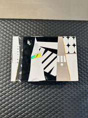 Nike Air Max 1 Evolution of Icons d’occasion, mélange de cuir, suede et mesh, coloris multiples inspirés des Air Max historiques, sneaker en bon état général.