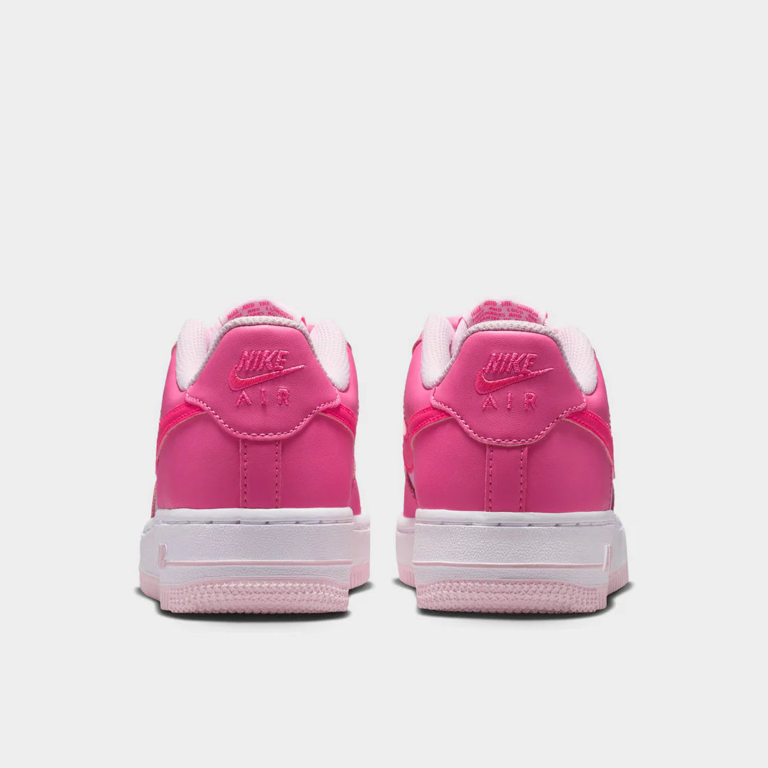 Sneakers Nike Air Force 1 Low GS roses Pinksicle et Pink Foam en cuir premium avec amorti Air iconique
