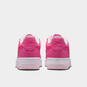 Sneakers Nike Air Force 1 Low GS roses Pinksicle et Pink Foam en cuir premium avec amorti Air iconique