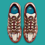 Sneaker Nike P-6000 N7 en mesh technique avec détails inspirés des cultures autochtones, amorti confortable et silhouette rétro-running des années 2000 vue de profil