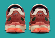 Sneaker Nike P-6000 N7 en mesh technique avec détails inspirés des cultures autochtones, amorti confortable et silhouette rétro-running des années 2000 vue de profil