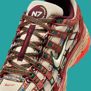 Sneaker Nike P-6000 N7 en mesh technique avec détails inspirés des cultures autochtones, amorti confortable et silhouette rétro-running des années 2000 vue de profil