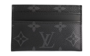 Louis Vuitton Card Holder Porte Cartes Double Monogram Eclipse Black/Grey en toile Monogram noire et grise avec quatre fentes et poche centrale.