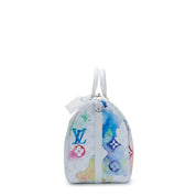 Louis Vuitton Keepall 50 Monogram Watercolor en toile Monogram effet aquarelle avec garnitures en cuir naturel, poignées roulées, bandoulière amovible, fermeture zippée et finitions métalliques.