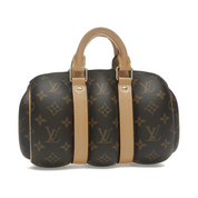 Louis Vuitton Keepall Bandoulière 25, sac compact de luxe avec poignées roulées, bandoulière réglable et amovible, fermeture zippée et silhouette emblématique de la collection Keepall.