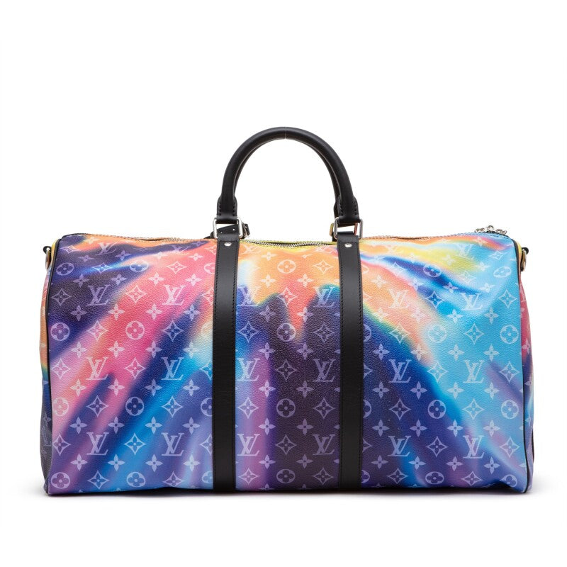 Louis Vuitton Keepall Bandoulière 50 Sunset Monogram Multicolor en toile Monogram multicolore avec garnitures en cuir naturel, poignées roulées, bandoulière amovible, fermeture zippée et finitions métalliques.