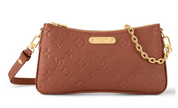Louis Vuitton Liv Pochette Cognac cuir pochette zip or